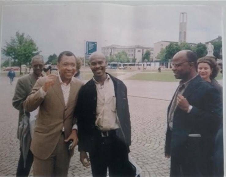 On the road for an exhibition abroad, with curator Okwui Enwezor.